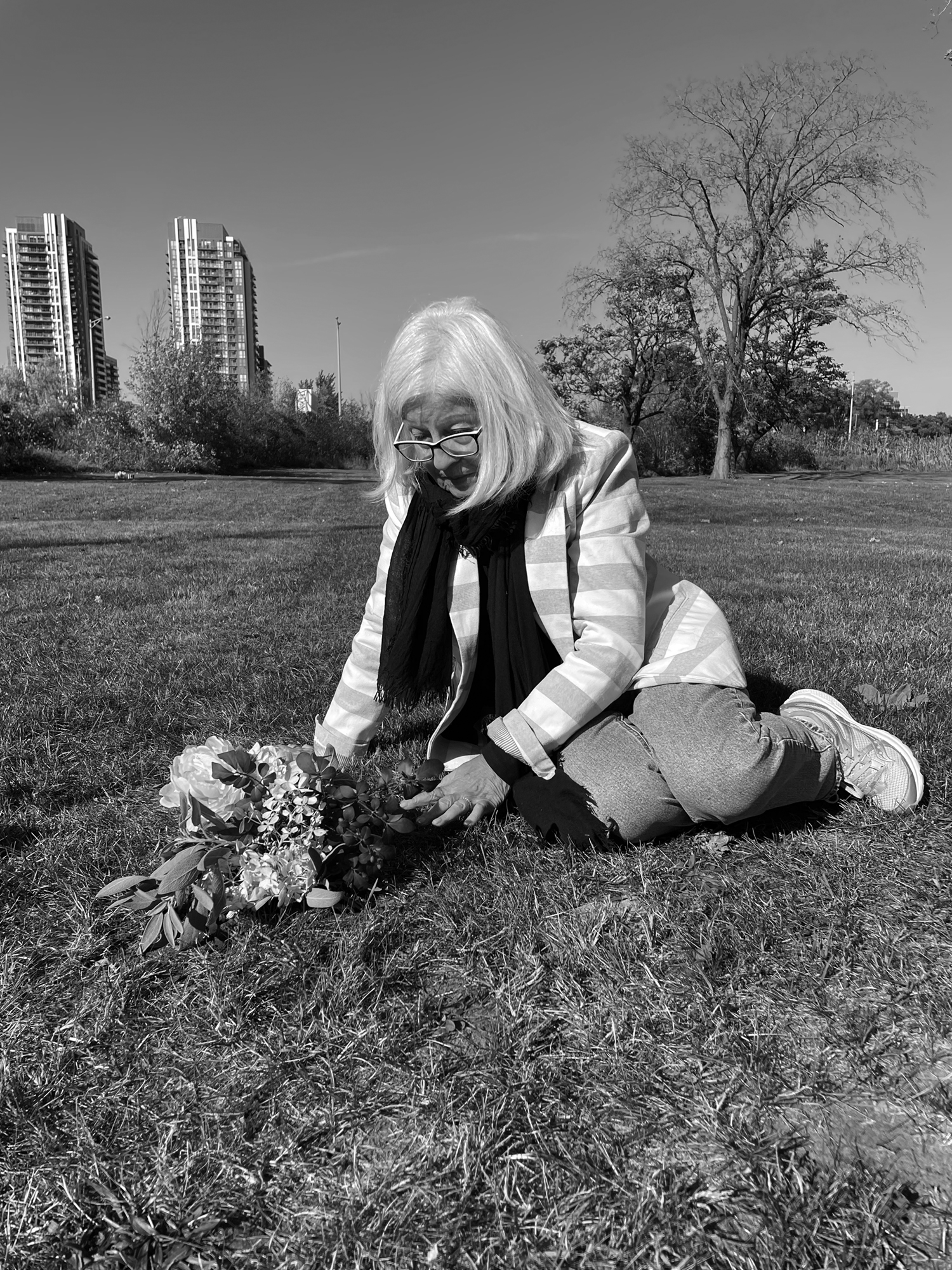 Sheila at Annie's gravesite - photo credit Tanya Talaga